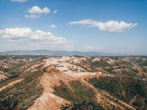 High angle view of hilly landscape against sky in tuscany italy Stock Photos