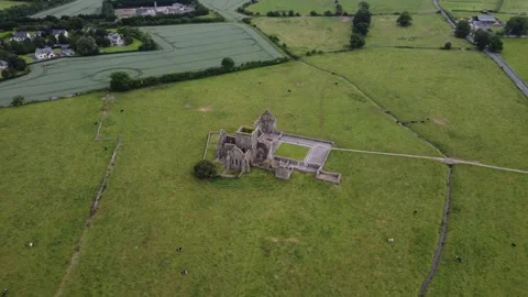 High angle view of historic abbey ruins surrounded by greenery. Stock Footage 327624113