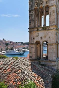 High angle view of historic Franciscan monastery bell tower and tiled roofs.  Stock Photos