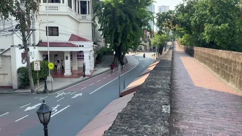 High angle view of a historic wall path and street scene in Intramuros 4K Vídeos de archivo 337457842