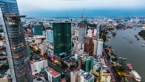 High angle view of Ho Chi Minh City downtown, Vietnam day to night time lapse 動画素材 116877554