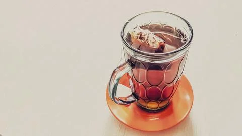 High angle view. A hot drink in the form of a tea bag in a glass. Stock Photos