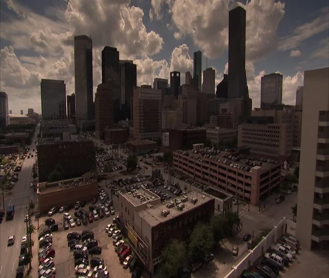 High angle view of Houston skyline and parking lots. Stock Footage 86697369