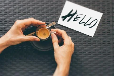 High Angle View Of Human Hands Holding Coffee Cup Foto stock