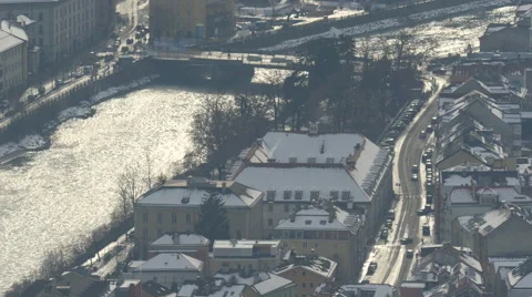 High angle view of Inn River flowing and cars driving on street, Innsbruck Stock Footage 61407721