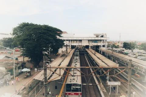 High angle view of a KAI Commuter line train arriving at station Stock Photos