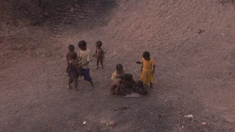High angle view of kids playing on ground Stock-Footage 90858649