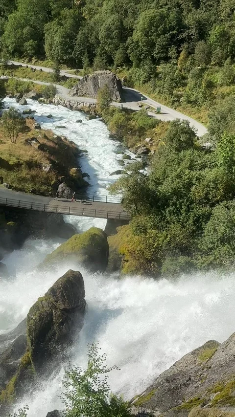 High Angle View Of Kleivafossen Waterfall And Bridge In Oldedalen Norway Stock-Footage 346970035