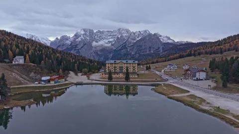 High-angle view of Lago di Misurina and golden forest, Dolomites Stock Footage 321608451