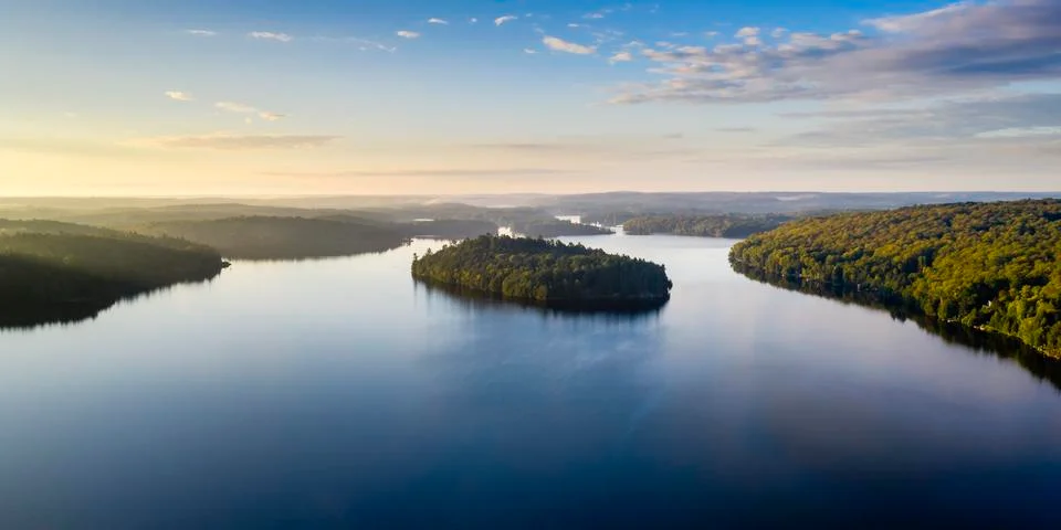 High angle view of a lake and forest Stock Photos