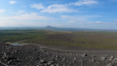 High-angle view of Lake Myvatn and volcanic plains from Hverfjall crater Stock-Footage 333462282