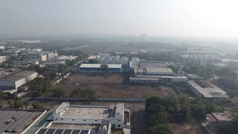 High Angle View of Large Vacant Industrial Plot and Surrounding Factories in 動画素材 332918994