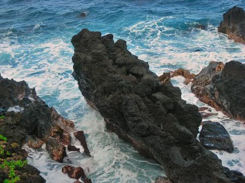 High Angle View of Lava Cliffs at Waianapanapa State Park in Hana, Hawaii on the Stock Photos