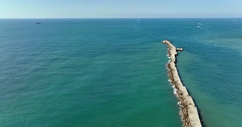 High Angle View With Lighthouse, Rocks And Sea Stock Footage 227922425