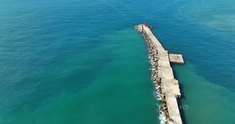 High Angle View With Lighthouse, Rocks And Sea Stock Footage 227922521