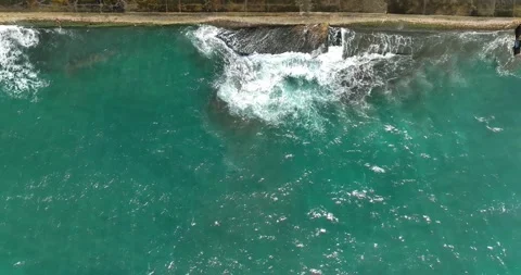High Angle View With Lighthouse, Rocks And Sea Stock Footage 227922942