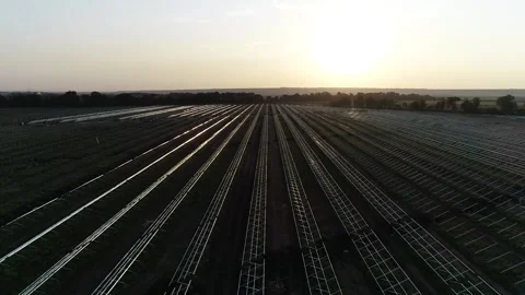High angle view of long rows of racks in the field, solar power station Stock Footage 158686466