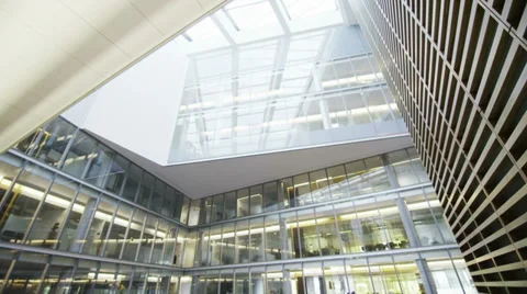 High angle view looking down on business people in large corporate building Stock Footage 35174808