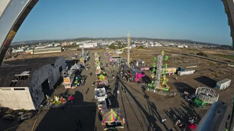 High angle view looking down at carnival midway and rides Stock Footage 346271956