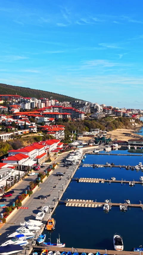 High angle view of luxury marina and coastal resort buildings Vertical video. Video stock 332344012