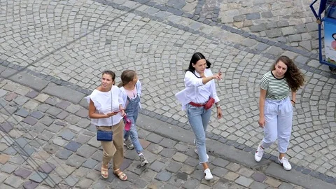 High angle view Lviv, Ukraine people family walking on square Video stock 97683010