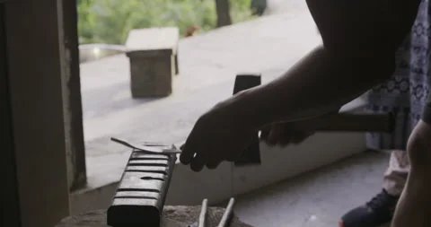 High angle view male master working on detail Stockbeeldmateriaal 141361931