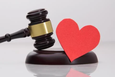 High angle view of mallet and heart on table in Stock Photos