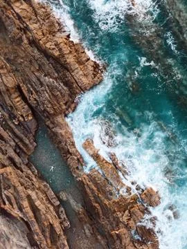 High angle view of a man relaxing in the natural swimming pool Stock Photos
