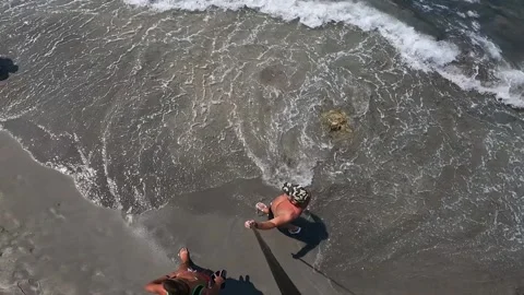 High-angle view of man walking on crowded beach on hot summer day Stock-Footage 279864865