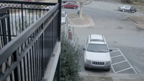 High Angle View of Man Walking to SUV in Parking Lot 库存影片 343933115
