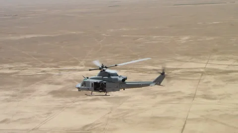 High angle view of marine huey helicopter over afghanistan desert (HD) Stock Footage 39299403