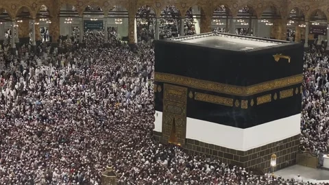 High-angle view of massive Muslim crowd performing Tawaf around holy Kaaba Stock Footage 340195550