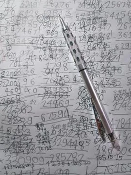 High Angle View of Mechanical Pencil on Hand-Written Math Calculation Paper S Stock Photos