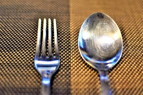 High angle view of metal fork and spoon Stock Photos