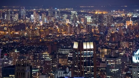 High Angle View of Midtown Manhattan and Brooklyn at Night Video stock 76854641