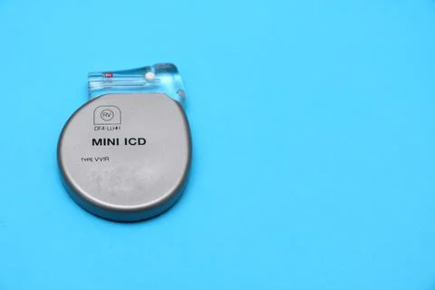 High angle view of a mini implantable cardioverter defibrillator (ICD) device. Stock Photos