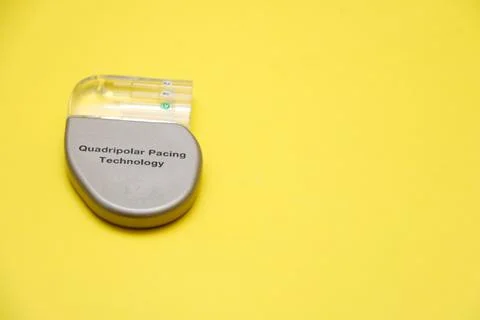 High angle view of a mini implantable cardioverter defibrillator (ICD) device. Stock Photos