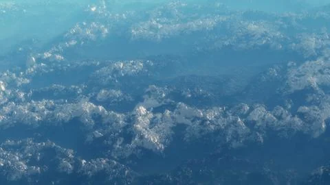 High angle view of misty mountain range covered with snow. Stock Illustration