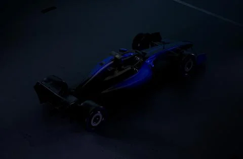 High angle view of a modern generic sports racing car standing in a dark garage Illustrazione stock