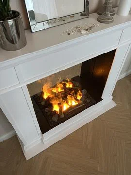 High Angle View of Modern White Fireplace with Realistic 3D Flames 库存照片