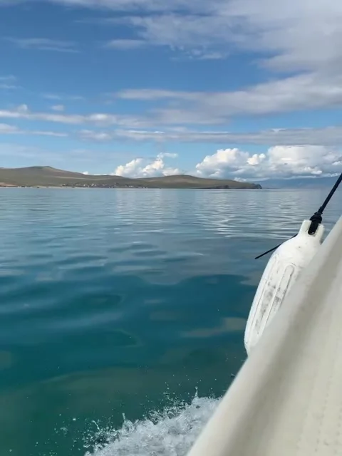 High-Angle View of a Motorboat Cruising on Open Water Vídeos de archivo 341317979