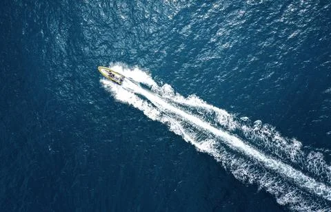 High angle view of a motorboat speeding on the ocean Stock Photos