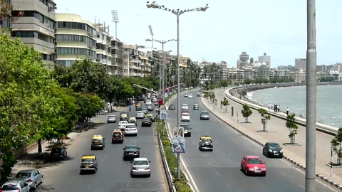 High angle View Moving road traffic, Marine Drive Mumbai city Maharashtra India Stock Footage 232211703