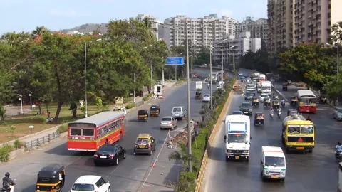 High angle View of moving road traffic, Powai Lake Mumbai city Maharashtra India Stock Footage 232236509
