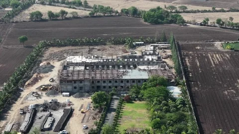 High Angle View of Multi-Story Building Construction Site with Heavy Industrial Stock Footage 340301535