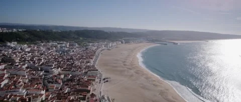 High-angle view of Nazaré's white buildings and traditional red-tiled roofs. Stock Footage 329118886