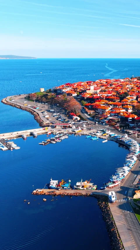 High angle view of Nessebar port and red roofs Vertical video. Video stock 332344531