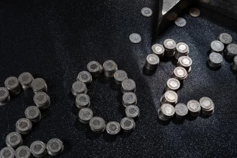 High angle view of New Years 2021 as Swiss coins on a black background. Foto stock