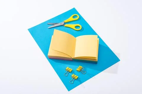 High angle view notebook scissors Stock Photos