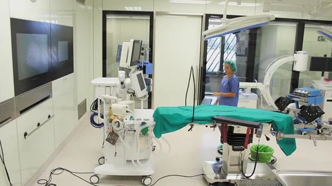 High angle view of nurse checking medical equipment in new operating theatre. 스톡 동영상 129897742